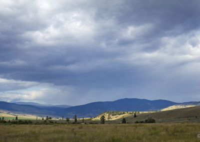 Angry clouds over country fields