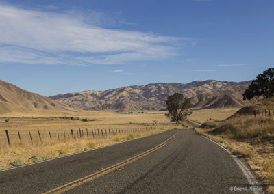 Roadways through golden hills