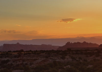 Dawns light over desert landscape
