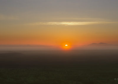Sunrise filtered through morning mist