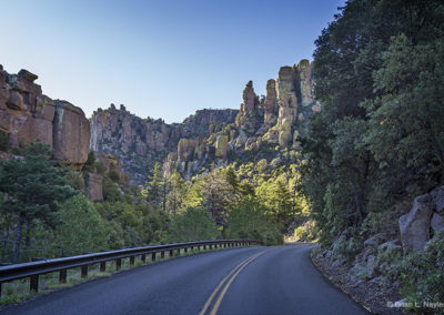 Roadway view to mountain formations