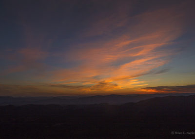 Wispy cloud sunset